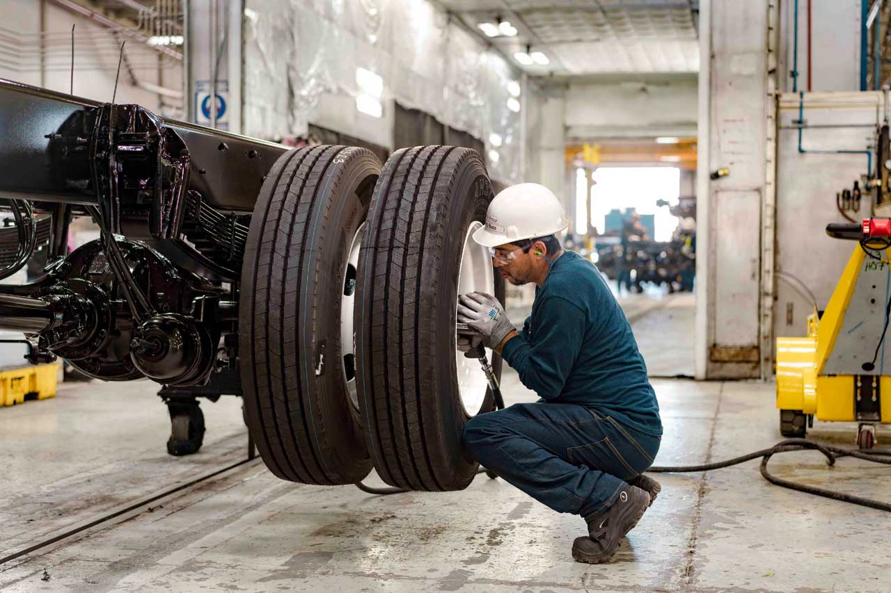 Man Working On Tire Man Working On Tire