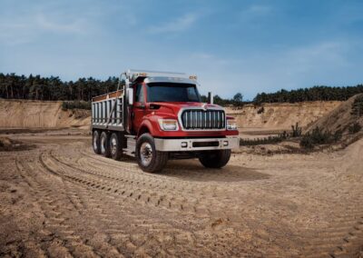 International Hv Foreground Front Gravelpit Dumptruck