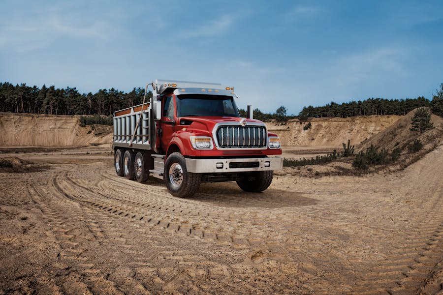 International Hv Foreground Front Gravelpit Dumptruck